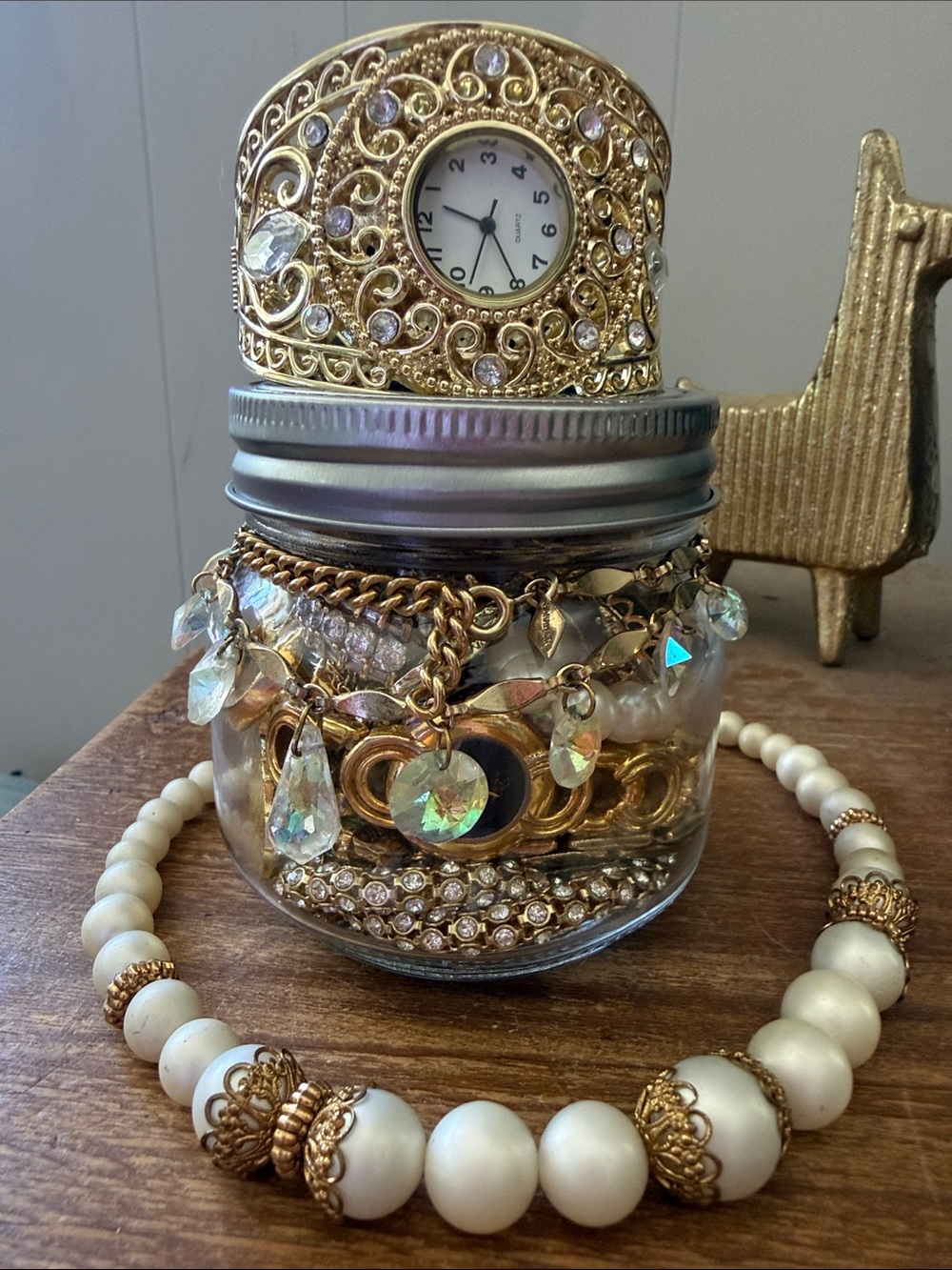 The slick golden bling is on mystery jewelry jar